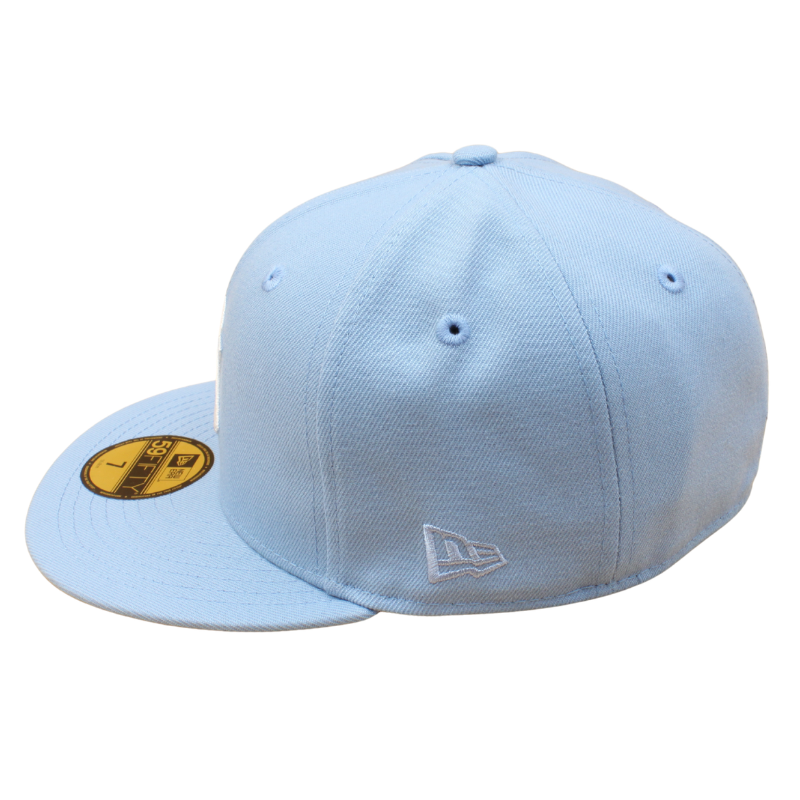 New Era 59FIFTY New York Yankees World Series 1962 kasket i Birdseye Blue og Pink UV med logo og flat skygge