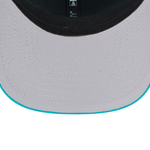 Ny Era Miami Dolphins 9SEVENTY stretch mesh snapback cap med justerbar snaplukning og mesh-paneler.