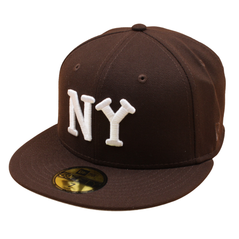 Sort New York Yankees 59FIFTY New Era kasket med brunt trædesign og flat top, sporty og stilfuld hovedbeklædning.