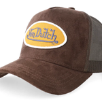 Mørkebrun Von Dutch trucker cap med oval patches i ruskind, justerbar rem og mesh baggrund.