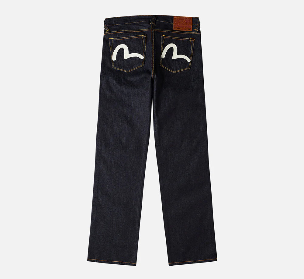Hvide EVISU jeans med søfugl-tryk, lommer i rå indigo denim, afslappet pasform og klassisk stil.