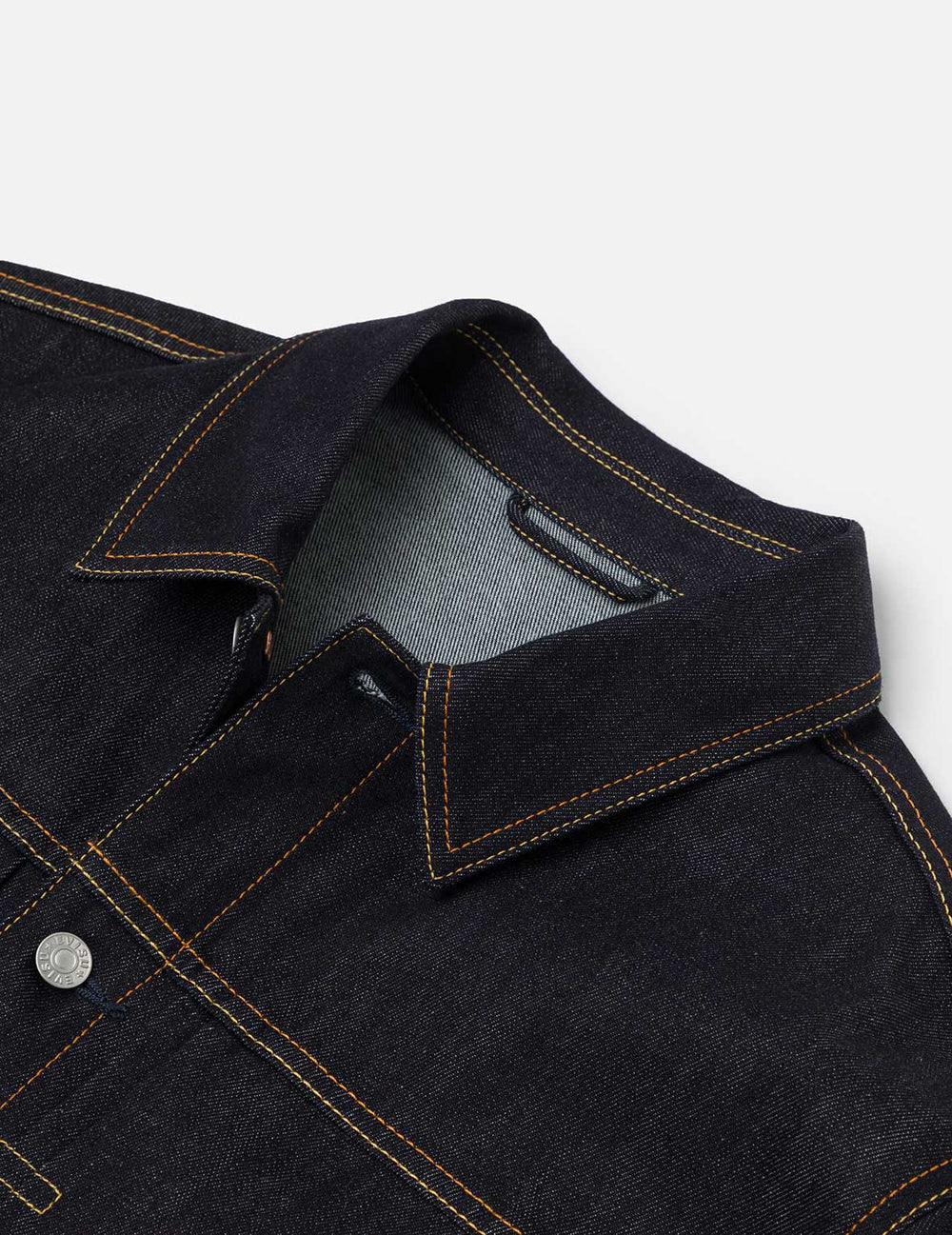 EVISU denimjakke med fuglemønster i rå indigo, klassisk jakketype med synlige syninger og trykdetaljer, afslappet stil.