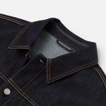 EVISU denimjakke med fuglemønster i rå indigo, klassisk jakketype med synlige syninger og trykdetaljer, afslappet stil.