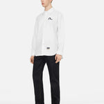 Hvid EVISU skjorte med sort mågeskibsprint, langærmet Oxford-stil, detaljeret og moderne design, vises i billedet.