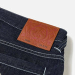 Evisu jeans med håndtrykt Daicock print i rinset indigo, klassisk slim fit denim med detaljrig design og synlige syninger.