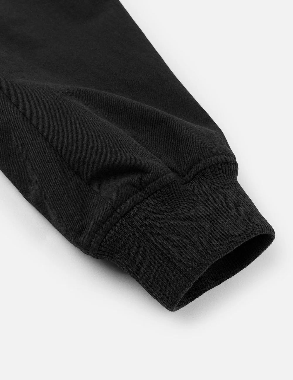 Sort EVISU-bomberjakke med Daicock-print, vises med detaljeret design og logo på forsiden.