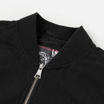 Sort EVISU bomberjakke med daicock-print, let polstret design og afslappet pasform, perfekt til udendørs brug.
