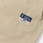 Beige EVISU shorts med seagull print, vævet design, afslappet pasform, perfekt til sommer- og fritidstøj.