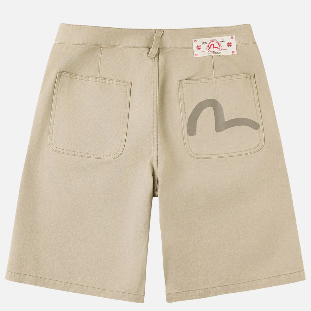 Beige EVISU shorts med fuglemønster og vævet tekstur, perfekt til afslappet sommerlook.