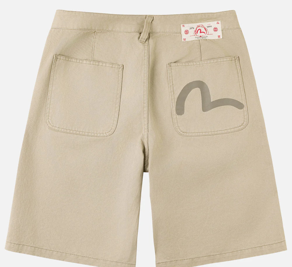 Beige EVISU shorts med fuglemønster og vævet tekstur, perfekt til afslappet sommerlook.