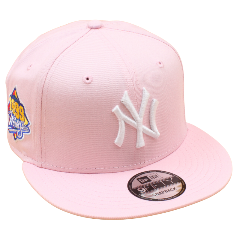New Era 9FIFTY snapback cap med New York Yankees 1999 World Series logo i pink og grå med UV-beskyttelse