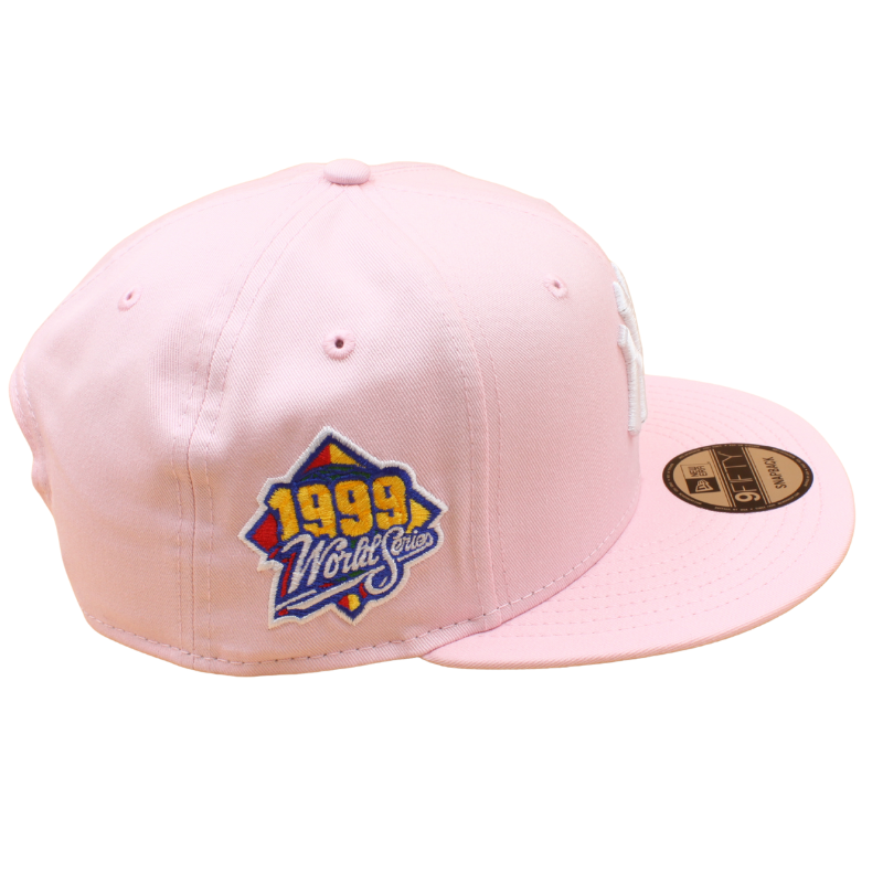 New Era 9FIFTY snapback cap med New York Yankees 1999 World Series design i pink og grå med UV-beskyttelse