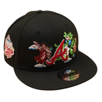 Sort og lyserød New Era 9FIFTY snapback cap med Atlanta Braves logo og blomstermønster, UV-beskyttelse.