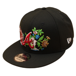 Sort og lyserød New Era 9FIFTY snapback cap med Atlanta Braves og blomsterprint, UV-beskyttelse.
