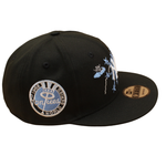 Sort og lyseblå New Era 9FIFTY snapback cap med Yankees 1962 World Series logo, vises foran.
