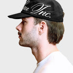 Lau Lau baseballkasket i sort med loop-design, afslappet og stilfuld cap til hverdag.