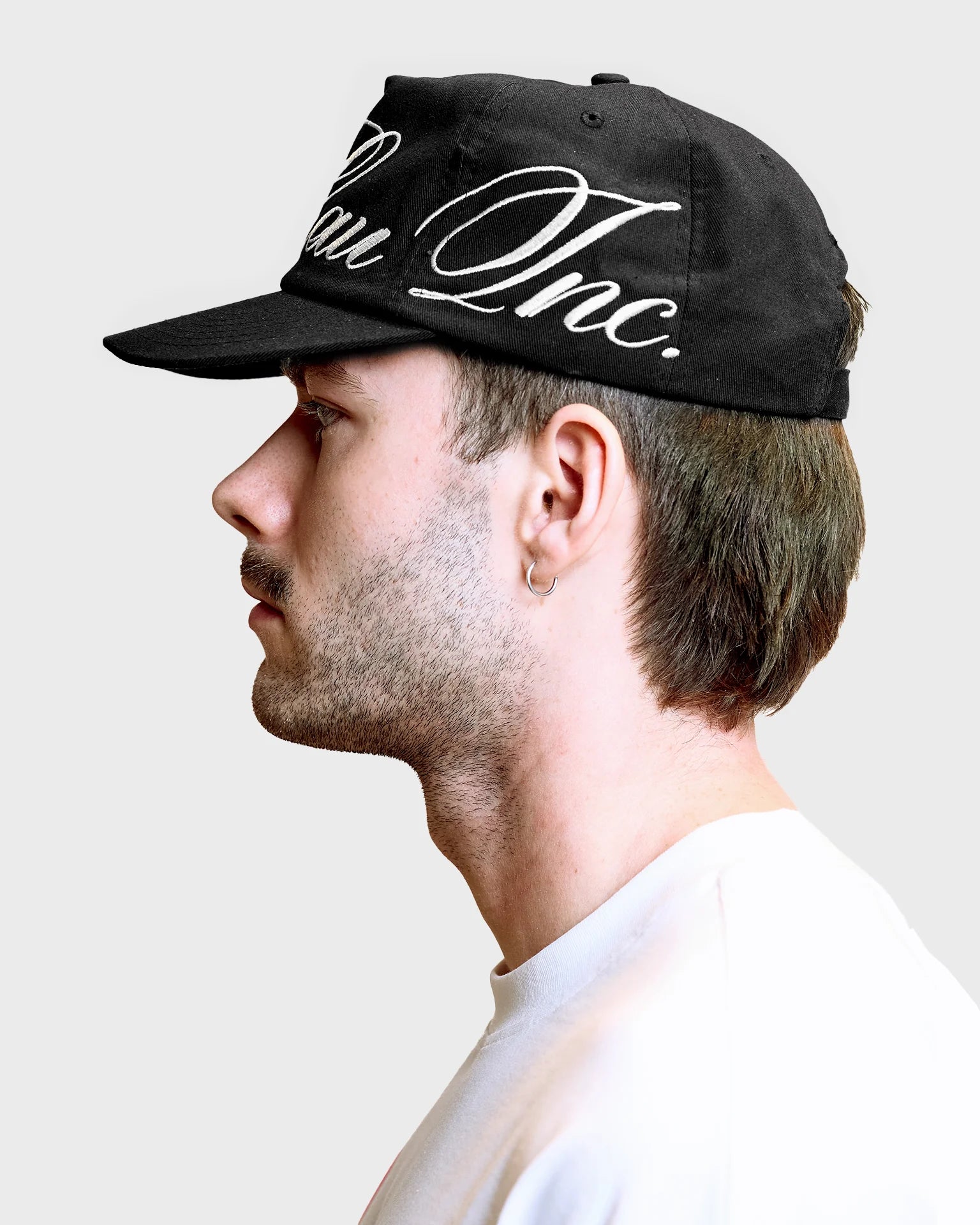 Lau Lau baseballkasket i sort med loop-design, afslappet og stilfuld cap til hverdag.