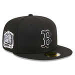 Sort New Era 59FIFTY Fitted Cap med Boston Red Sox logo og 1999 AST, flettet i sort med hvid og grøn detalje.