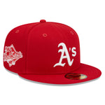 New Era 59FIFTY fitted cap med Oakland Athletics logo, rød farve og WS 1989-emblem, sportet af en person.