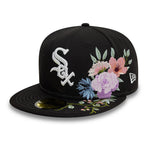 Sort New Era 59FIFTY fitted cap med hvid Sox logo og blomsterbroderi, designet til Chicago White Sox fans.