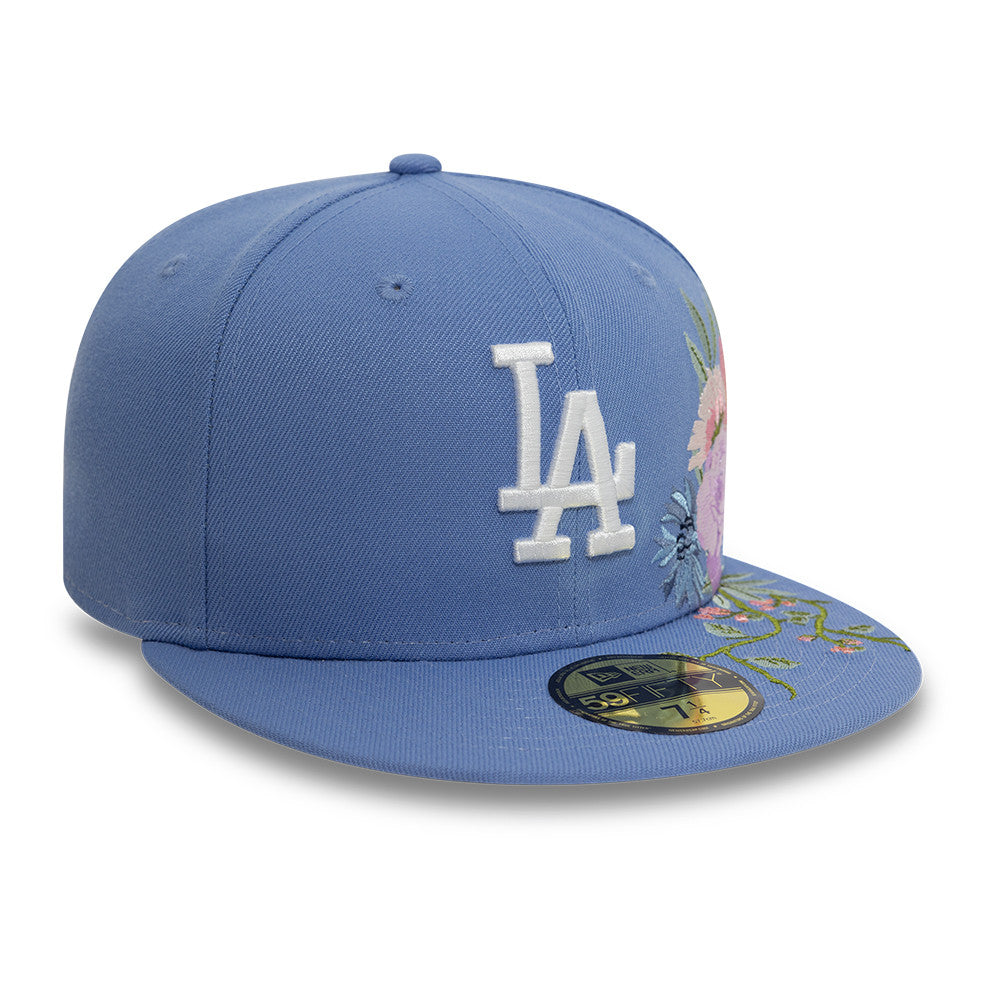Lys blå New Era 59FIFTY fitted cap med floral broderi af Los Angeles Dodgers logo, sporty og stilfuld.