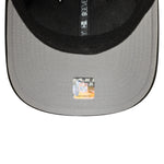 Sort New Era 9SEVENTY Stretch Snapback cap med Las Vegas Raiders logo, justeret pasform og sporty design.