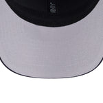 New Era 9SEVENTY stretch mesh snapback cap med New York Yankees logo i navyblå farve, sporty og komfortabel hovedbeklædning.