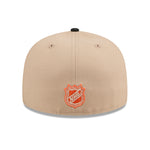 New Era 59FIFTY fitted kasket med Anaheim Ducks logo i camel og sort farve, synlig på billedet.