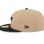 Sort og camel farvet New Era 59FIFTY fitted cap med Los Angeles Kings logo, set fra venstre side.