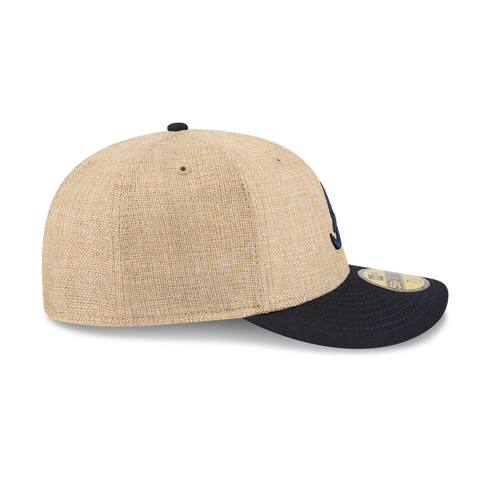 New Era 59FIFTY fitted cap til Atlanta Braves i twine-materiale med XTN-design, synlig foran på billedet.