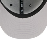 Sort New Era 59FIFTY fitted baseballkasket med Mets logo og eagle-design, klassisk og stilfuld til sport og fritid.