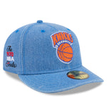 New Era 59FIFTY fitted cap med Knicks logo, blå Hardwood Classic design, snapback, foran og vises på modellen