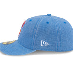New Era 59FIFTY fitted kasket i blå med Knicks logo, Hardwood Classic design, set fra sidet.