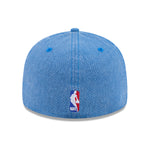 Blå New Era 59FIFTY fitted kasket med Knicks logo, Hardwood Classic design, synlig foran og på siden.