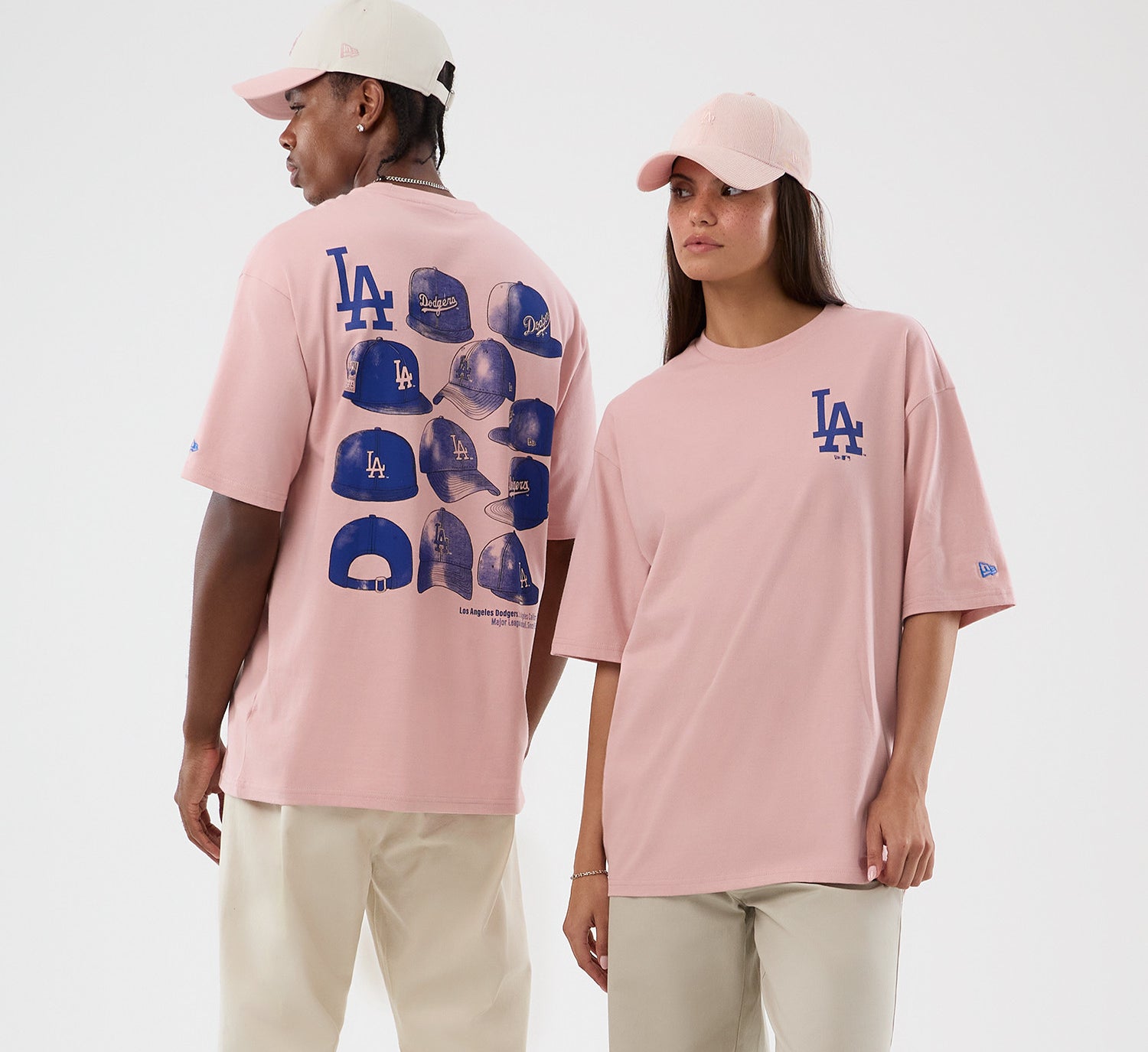 Pink New Era MLB T-shirt med Los Angeles Dodgers grafik og oversize pasform, casual sportstøj til fans.