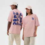 Pink New Era MLB T-shirt med Los Angeles Dodgers grafik og oversize pasform, casual sportstøj til fans.