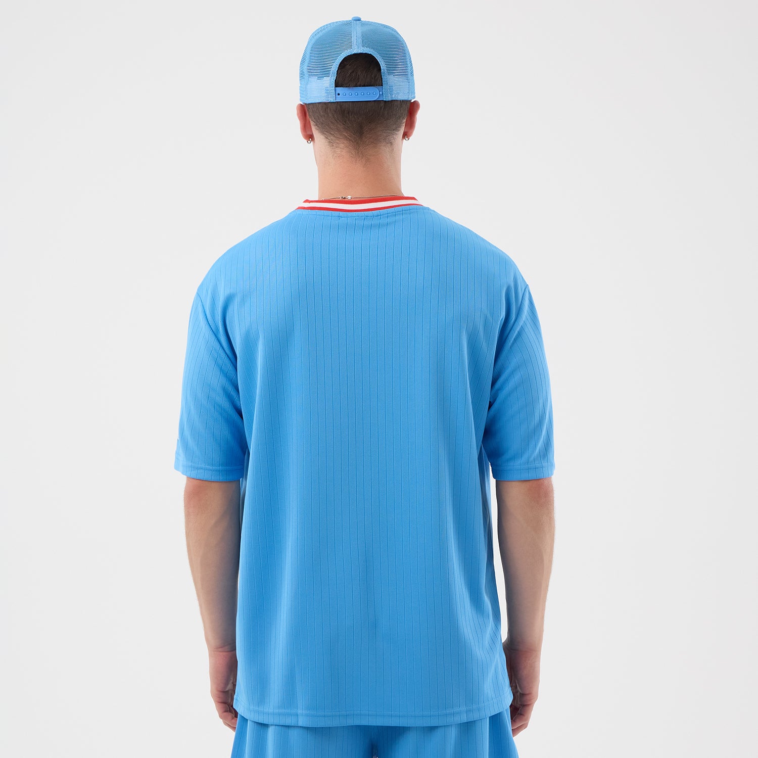 Blå New Era MLB ARCH oversize T-shirt med New York Yankees logo og baseball-tema, afslappet og komfortabelt design.