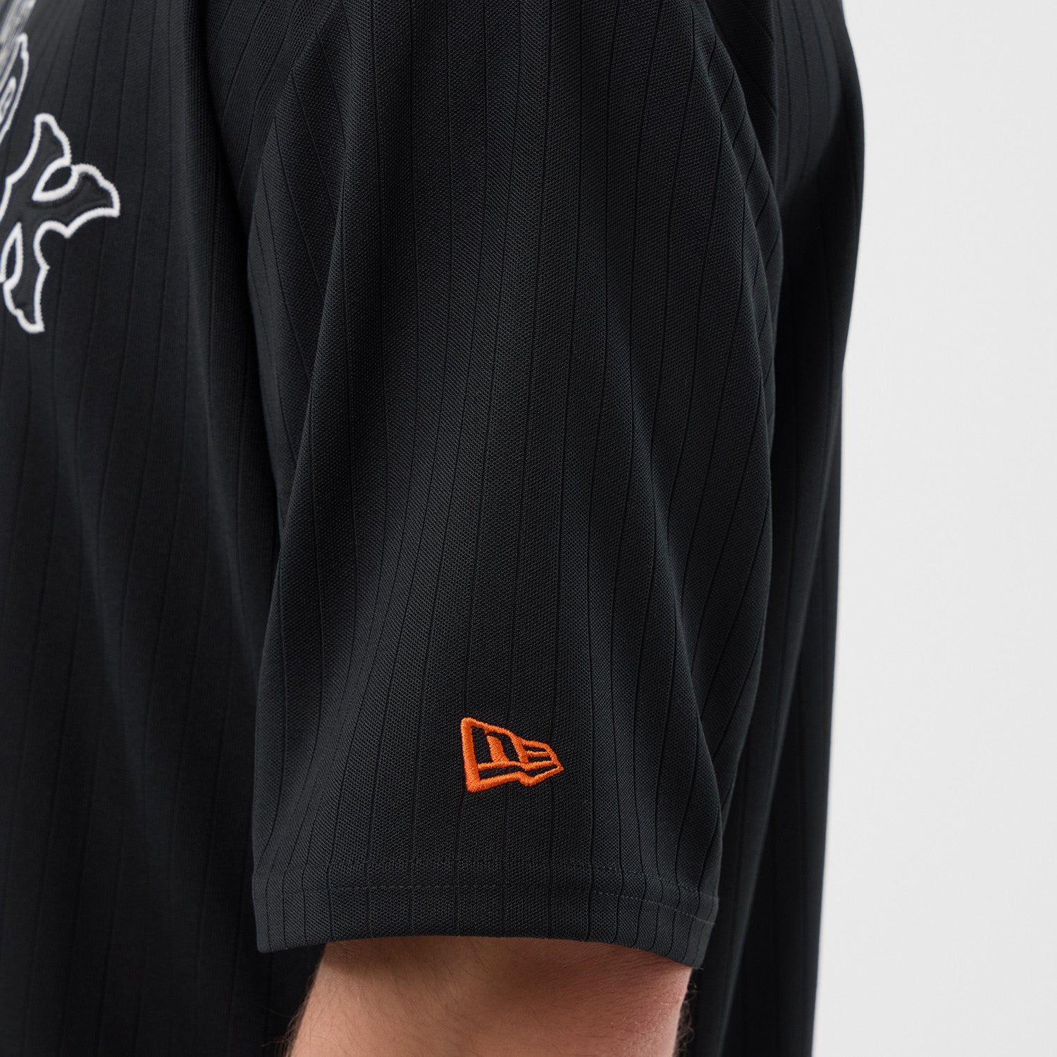 Sort New Era MLB ARCH oversize T-shirt med Mets-logo og grafiske detaljer, komfortabelt og stilfuldt til fans.