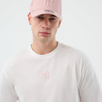 Hvid og lyserød New Era MLB LE MIDI oversize t-shirt med Yankees logo på front, casual sportsstil.