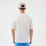 Hvid og lyserød New Era MLB LE MIDI oversize t-shirt med Yankees logo, afslappet stil og sportsinspireret design.
