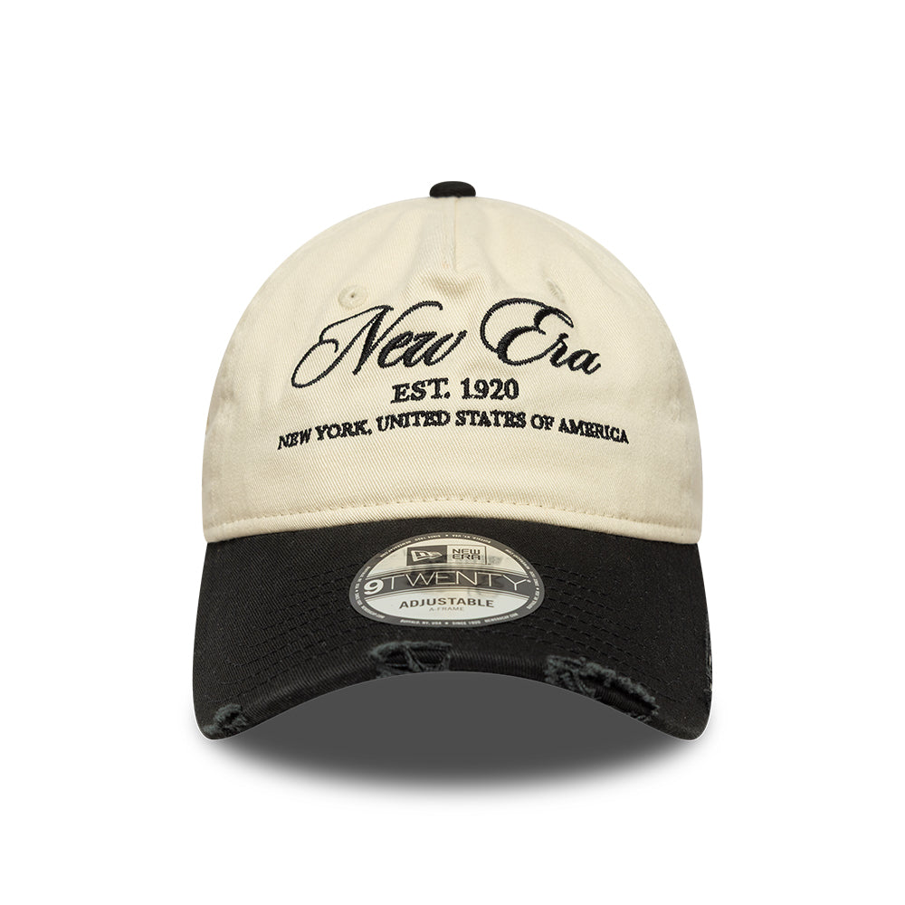 New Era 9TWENTY A-Frame cap i distressed denim med chrome og sort farve, afslappet stil, vises i billedet.