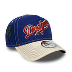 New Era 9FORTY E-Frame Los Angeles Dodgers cap i blå og krom med byikon design, sportstil og justerbar rem.