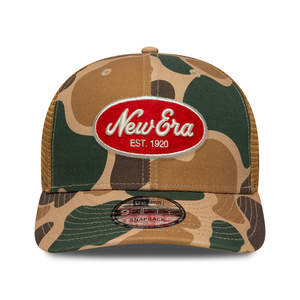 Sort og grøn New Era 9FIFTY Trucker Cap med duck camo mønster, justerbar snapback og netbag bagpå.