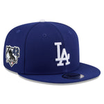 New Era Jackie Robinson 9FIFTY snapback cap med Los Angeles Dodgers logo og sort design, justeret til MLB fans.