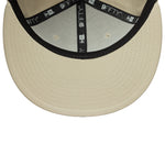 New Era 9FIFTY Original Fit New York Yankees cap i sten og hvid med flat visir og logo foran.