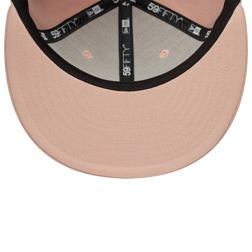 New Era 59FIFTY fitted cap med Yankees logo i pastel pink, sportlig og stilfuld baseballkasket.