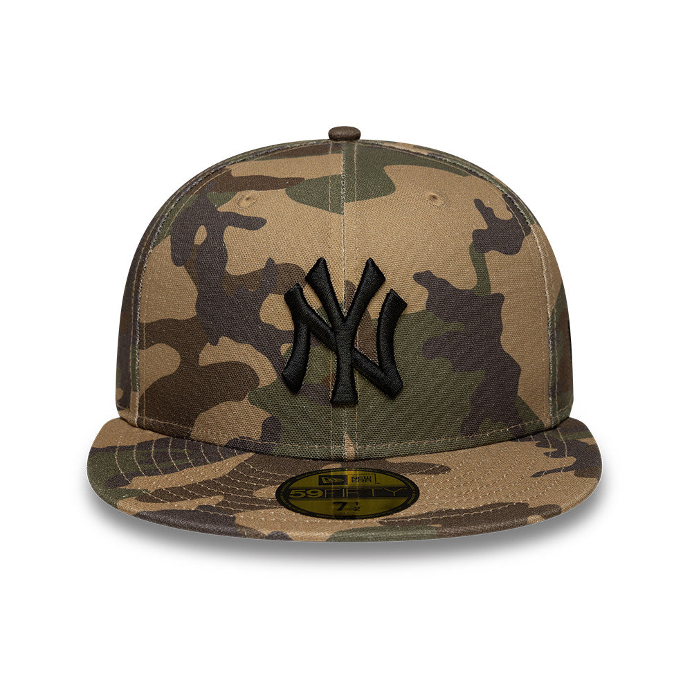 New Era 59FIFTY fitted cap med woodland camo mønster og New York Yankees logo på forsiden.