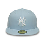 New Era 59FIFTY fitted Yankees cap i pastelblå med holdets logo, sporty og stilfuld baseballkasket.