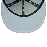 New Era 59FIFTY fitted Yankees cap i pastelblå med holdets logo foran, perfekt til baseballfans.