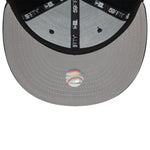 Sort og hvid New Era 59FIFTY fitted cap med Los Angeles Dodgers logo og hjerte-ikon, perfekt til fans.